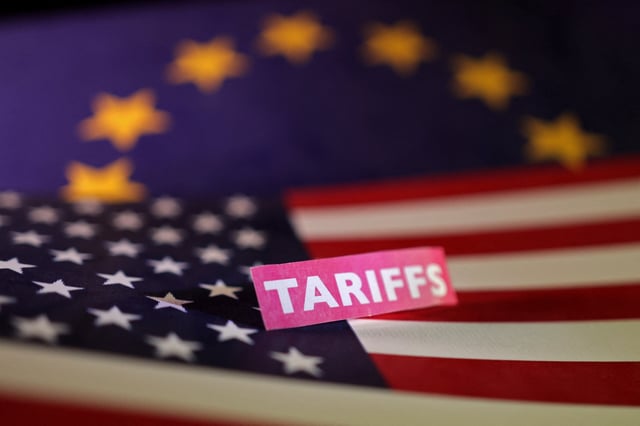 U.S. and European Union flags and a "tariffs" label are seen in this illustration taken April 10, 2025. REUTERS/Dado Ruvic/Illustration/ File Photo
