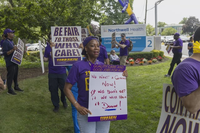 A file photo of 1199 members picketing.