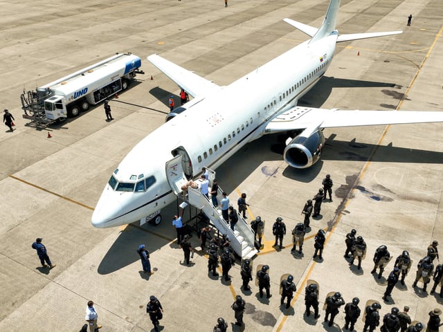 Venezuelan detainees are shown being sent home in a prison exchange for Americans held in Venezuela, according to El Salvador President Nayib Bukele, at El Salvador International Airport, in San Luis Talpa, El Salvador, in this handout picture obtained by Reuters on July 18, 2025. El Salvador Government/Handout via REUTERS ATTENTION EDITORS - THIS IMAGE HAS BEEN SUPPLIED BY A THIRD PARTY. NO RESALES. NO ARCHIVES