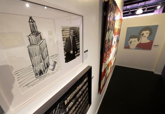 A drawing by President Donald J. Trump (L) on display at the Street, Contemporary and Celebrity Art Auction at Julien's Auctions Pop-UP Gallery in Beverly Hills, California. October 16, 2017.