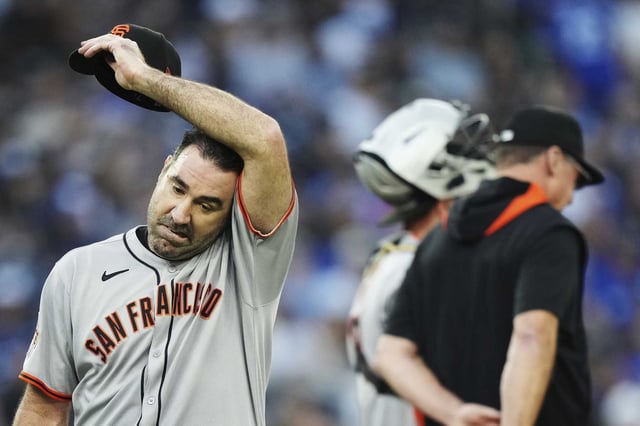 Giants starting pitcher Justin Verlander heads to the dugout after being taken out in the third inning Friday against the Blue Jays in Toronto.