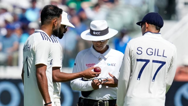 India's captain Shubman Gill, Akash Deep and Mohammed Siraj interact with an umpire over ball change on the first day of the Lord's Test