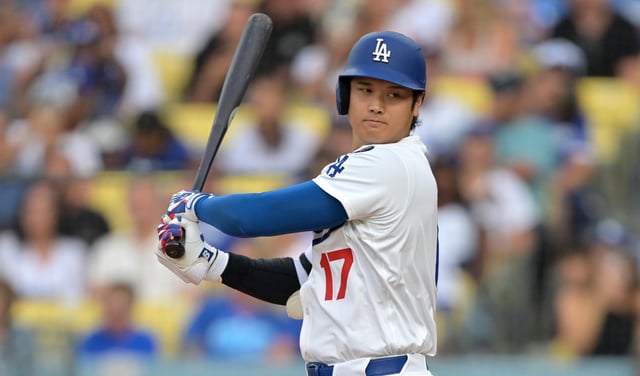 Dodgers star Shohei Ohtani strikes out during the first inning of their game against the Milwaukee Brewers on Friday night at Dodger Stadium. (Photo by Jayne Kamin-Oncea/Getty Images)