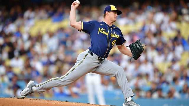 Jul 18, 2025; Los Angeles, California, USA; Milwaukee Brewers pitcher Quinn Priester (46) pitches against the Los Angeles Dodgers in the first inning at Dodger Stadium. Mandatory Credit: Gary A. Vasquez-Imagn Images