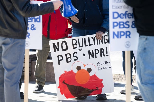 People participate in a rally to call on Congress to protect funding for US public broadcasters, Public Broadcasting Service (PBS) and National Public Radio (NPR), outside the NPR headquarters in Washington, D.C., on March 26, 2025. (Saul Loeb/AFP/Getty Images/TNS)