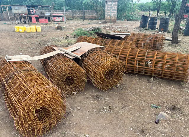 BRC mesh for reinforcing canals lie abandoned at a construction site, following the decision to slash nearly all U.S. foreign aid that has left numerous water and sanitation projects incomplete, in Eldoro village of Taveta county, Kenya June 23, 2025. REUTERS/Jefferson Kahinju/File Photo