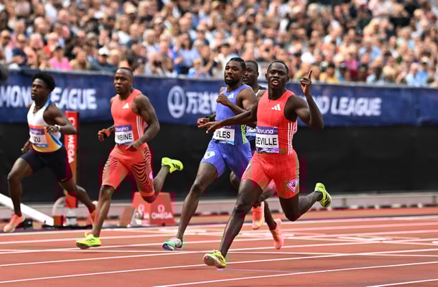 Athletics - Diamond League - London - London Stadium, London, Britain - July 19, 2025 Jamaica's Oblique Seville celebrates after winning the Men's 100m final ahead of Lyles Noah of the U.S. REUTERS/Dylan Martinez
