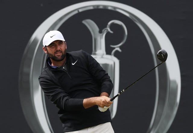 Golf - The 153rd Open Championship - Royal Portrush Golf Club, Portrush, Northern Ireland, Britain - July 19, 2025 Scottie Scheffler of the U.S. hits his tee shot on the 1st hole during the third round REUTERS/Paul Childs