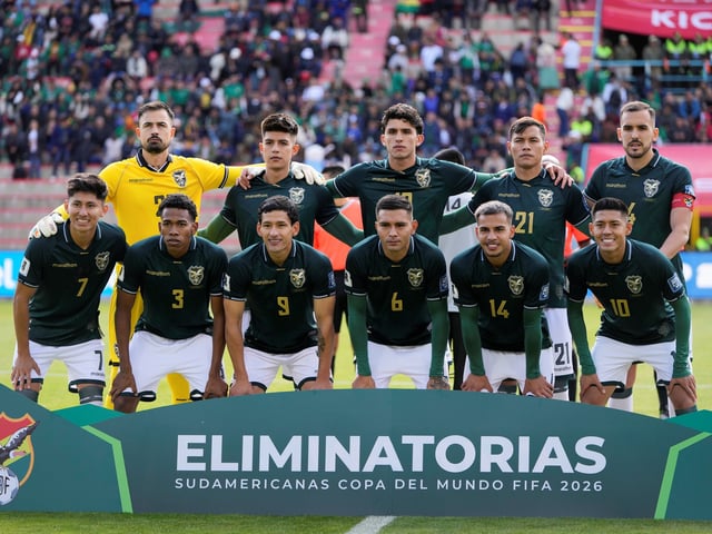 Bolivia's players pose for a team photo before a qualifying soccer match for the World Cup 2026 against Uruguay in El Alto, Bolivia, Tuesday, March 25, 2025. (AP Photo/Juan Karita)