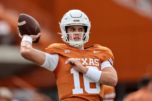 Arch Manning #16 of the Texas Longhorns warms up before the game against the Brigham Young Cougars at Darrell K Royal-Texas Memorial Stadium on October 28, 2023 in Austin, Texas.