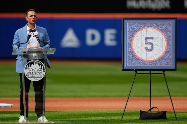 Former New York Mets third baseman David Wright speaks during a ceremony ahead of a baseball game against the Cincinnati Reds, Saturday, July 19, 2025, in New York. (AP Photo/Yuki Iwamura)
