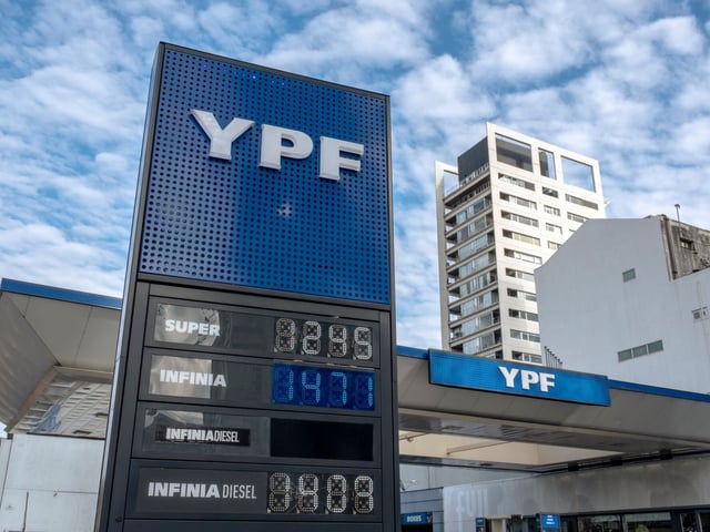 A YPF SA gas station in Buenos Aires, Argentina, on Sunday, July 13, 2025. Analysts surveyed by the central bank expect a slight month-on-month uptick in June to 1.8%, implying a 14th straight lower annual print to just under 40% -- down from 289.4% last April. Photographer: Erica Canepa/Bloomberg