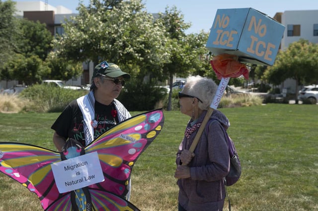 Diane Wang and Lenore Sheridan protest the prospect of new immigrant detention centers.