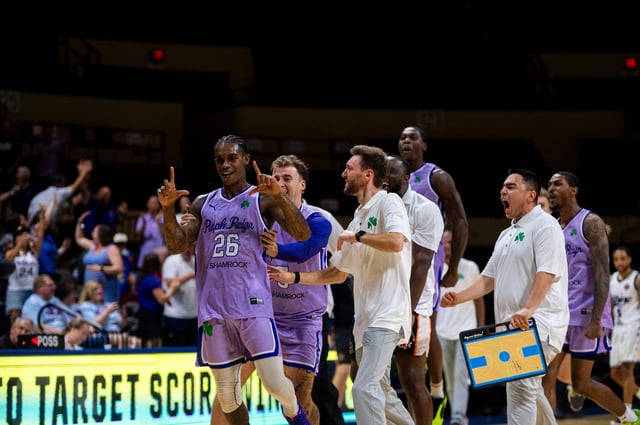 Purple Reign guard Shaun Williams (26) celebrates after knocking down the game-winning 3-pointer in an 85-84 victory over The Shine on Saturday in the first round of The Basketball Tournament's Kansas City Regional at Municipal Auditorium. Justin Mohlinq/TBT