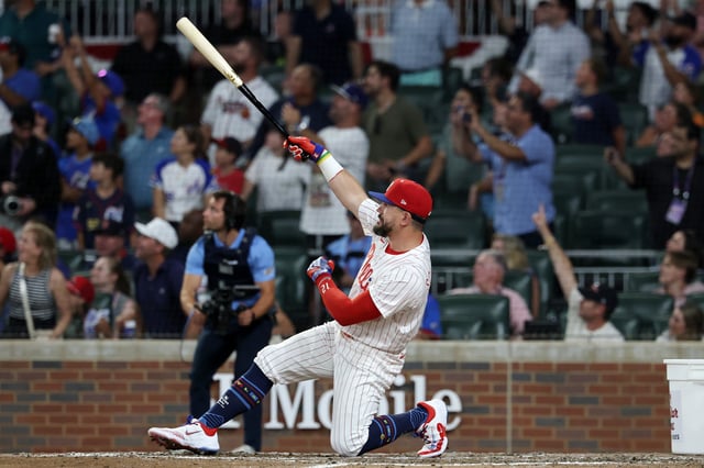 ATLANTA, GEORGIA - JULY 15: Kyle Schwarber #12 of the Philadelphia Phillies reacts after hitting three home runs in the swing-off to decide the MLB All-Star Game at Truist Park on July 15, 2025 in Atlanta, Georgia.