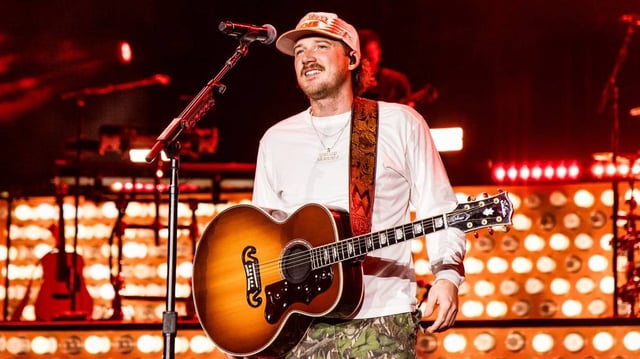 KNOXVILLE, TENNESSEE - SEPTEMBER 20: Morgan Wallen performs onstage for night one of his One Night At A Time tour at Neyland Stadium on September 20, 2024 in Knoxville, Tennessee. (Photo by John Shearer/Getty Images for Morgan Wallen’s One Night At A Time 2024)