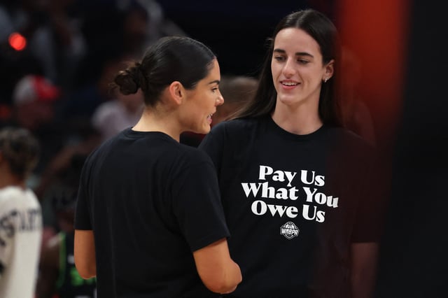 Jul 19, 2025; Indianapolis, IN, USA; Team Clark guard Caitlin Clark (22) and Team Collier guard Kelsey Plum (10) before the 2025 WNBA All Star Game at Gainbridge Fieldhouse. Trevor Ruszkowski-Imagn Images