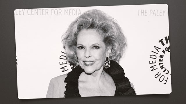 Eileen Fulton smiling on a carpet