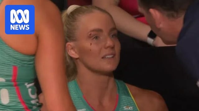 Melbourne Vixens goal keeper Rudi Ellis sitting on the bench, bleeding from a cut above the eye