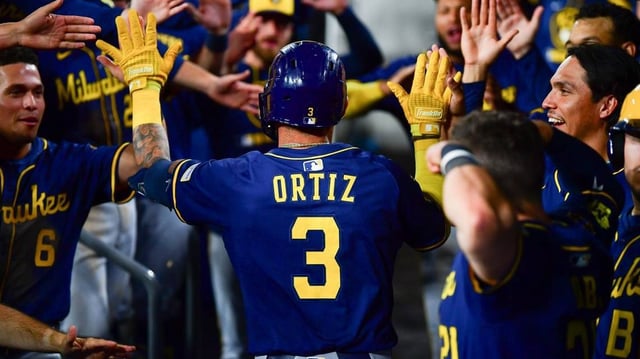 Jul 19, 2025; Los Angeles, California, USA; Milwaukee Brewers shortstop Joey Ortiz (3) celebrates after hitting a solo home run against the Los Angeles Dodgers during the eighth inning at Dodger Stadium. Mandatory Credit: Gary A. Vasquez-Imagn Images