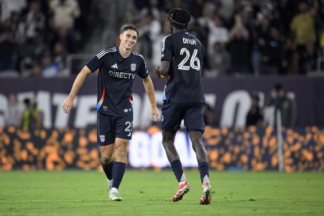 SAN DIEGO, CALIFORNIA – JULY 19: Ian Pilcher #25 of San Diego FC celebrates with Manu Duah #26 after scoring a goal against the Vancouver Whitecaps during the second half at Snapdragon Stadium on July 19, 2025 in San Diego, California. (Photo by Orlando Ramirez/Getty Images)