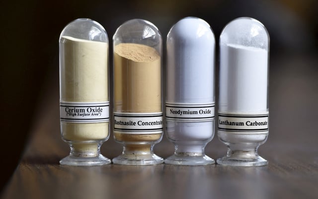 Samples of rare earth minerals from left, Cerium oxide, Bastnasite, Neodymium oxide and Lanthanum carbonate are on display during a tour of Molycorp's Mountain Pass Rare Earth facility in Mountain Pass, California June 29, 2015.  REUTERS/David Becker/File Photo
