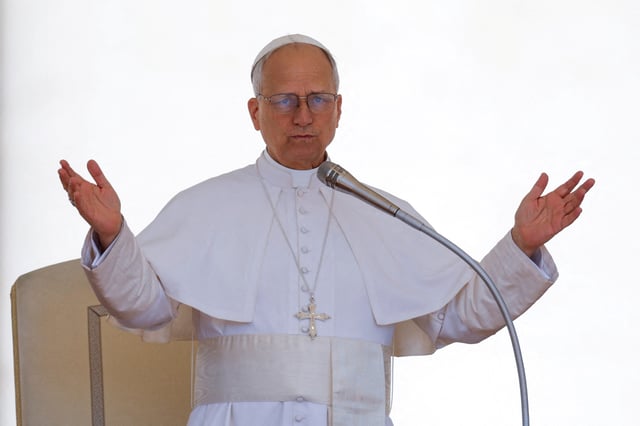 Pope Leo XIV gestures on the day he holds a general audience in St. Peter's Square at the Vatican, May 28, 2025. REUTERS/Remo Casilli/File Photo