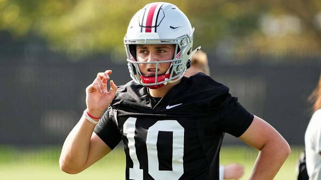 Aug 1, 2024; Columbus, OH, USA; Ohio State Buckeyes quarterback Julian Sayin (10) motions during football camp at the Woody Hayes Athletic Complex.