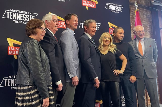 In-N-Out Burger President Lynsi Snyder, third from right, announces plans to move the corporate office to Tennessee during a visit with Gov. Bill Lee, center, and other officials in January 2023. Snyder says she will move from California to Tennessee, partly because “doing business is not easy here.”