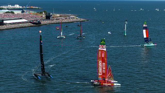 Sailing - SailGP - Great Britain Sail Grand Prix - Portsmouth, Britain - July 19, 2025 Emirates Great Britain SailGP Team helmed by Dylan Fletcher leads New Zealand SailGP Team helmed by Peter Burling on Race Day 1 Simon Bruty/SailGP/Handout via REUTERS/File Photo