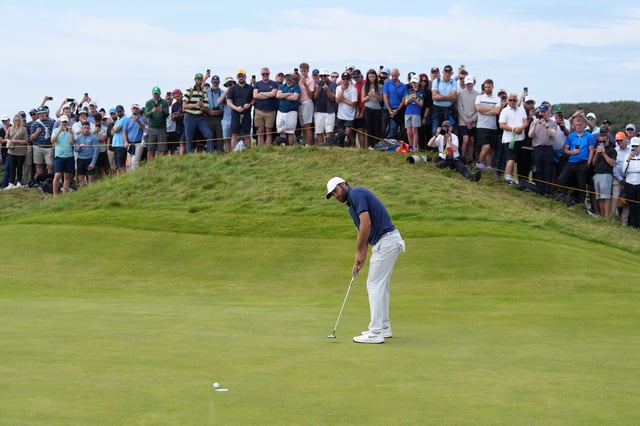 Golf - The 153rd Open Championship - Royal Portrush Golf Club, Portrush, Northern Ireland, Britain - July 20, 2025 Scottie Scheffler of the U.S. putts on the 10th green during the final round REUTERS/Maja Smiejkowska
