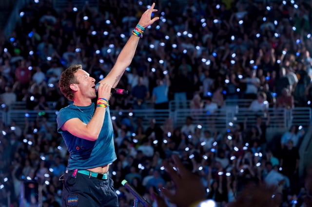 Coldplay frontman Chris Martin performs during the band’s first El Paso show at Sun Bowl Stadium on Friday, June 13.