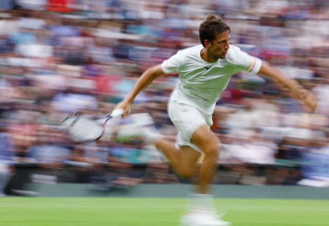Tennis - Wimbledon - All England Lawn Tennis and Croquet Club, London, Britain - July 2, 2024 Czech Republic's Vit Kopriva in action during his first round match against Serbia's Novak Djokovic REUTERS/Matthew Childs/File Photo