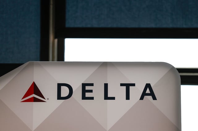 Delta signage at Minneapolis-St. Paul airport, Monday, Aug. 12, 2024, in Minneapolis. (Aaron M. Sprecher via AP)