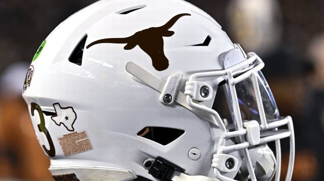 Nov 30, 2024; College Station, Texas, USA; A detail view of a Texas Longhorns helmet on the sideline during the first quarter against the Texas A&M Aggies. The Longhorns defeated the Aggies 17-7 at Kyle Field. Mandatory Credit: Maria Lysaker-Imagn Images