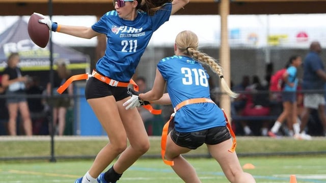 High school players take part in a girls flag football skills camp on Thursday in Canton, Ohio.
