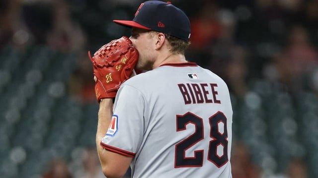 Jul 7, 2025; Houston, Texas, USA;  Cleveland Guardians starting pitcher Tanner Bibee (28) get set to pitch against the Houston Astros in the first inning at Daikin Park. Mandatory Credit: Thomas Shea-Imagn Images