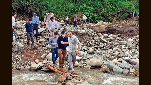 An inter-ministerial central team visits the affected areas in Mandi district on Sunday. (Birbal Sharma/HT Photo)