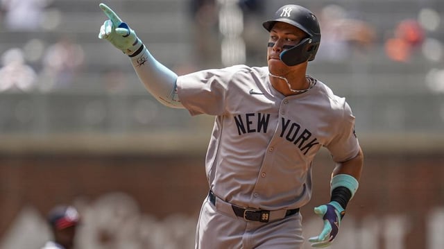 Jul 20, 2025; Cumberland, Georgia, USA; New York Yankees right fielder Aaron Judge (99) runs after hitting a home run against the Atlanta Braves during the first inning at Truist Park. Mandatory Credit: Dale Zanine-Imagn Images