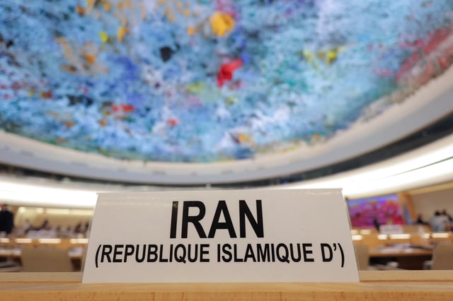 The sign at Iran's representative seat is placed in the room before a special session of the Human Rights Council at the United Nations in Geneva, Switzerland, June 20, 2025. REUTERS/Denis Balibouse/File Photo