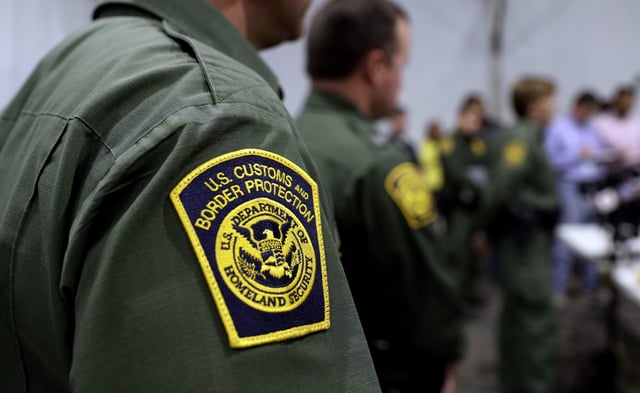 In this Thursday, May 2, 2019 file photo, Border Patrol agents hold a news conference prior to a media tour of a new U.S. Customs and Border Protection temporary facility near the Donna International Bridge in Donna, Texas.
