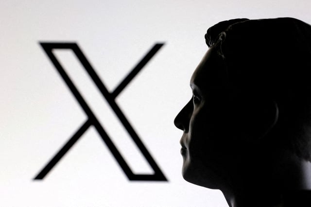 A 3D-printed miniature model of Elon Musk and the X logo are seen in this illustration taken January 23, 2025. REUTERS/Dado Ruvic/Illustration/File Photo