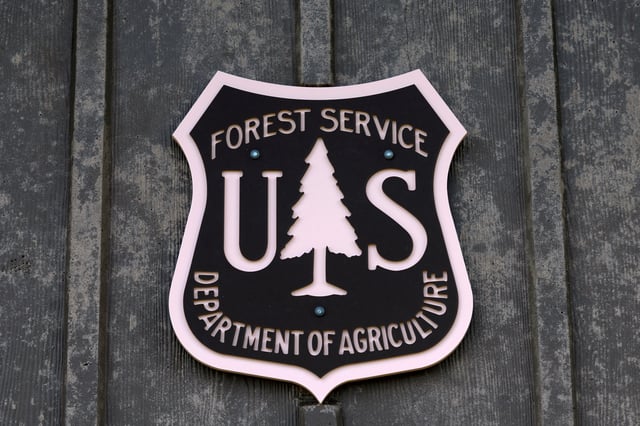 U.S. Forest Service signage is posted outside a closed bathroom facility in the Sacramento Mountains in the Lincoln National Forest in Alto, New Mexico, U.S. June 26, 2025. REUTERS/Kaylee Greenlee/File Photo