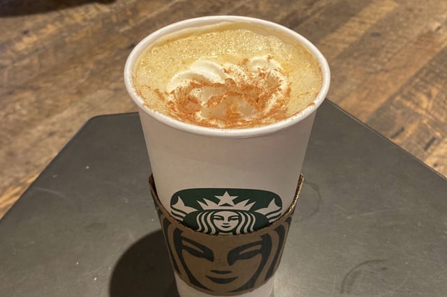 FILE - A Pumpkin Spice Latte drink rests on a table at a Starbucks in New York, on Thursday, Aug. 24, 2023. (AP Photo/Peter Morgan, File)