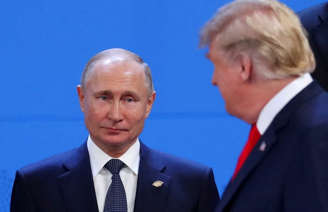 U.S. President Donald Trump and Russia's President Vladimir Putin are seen during the G20 leaders summit in Buenos Aires, Argentina November 30, 2018. REUTERS/Marcos Brindicci/File Photo