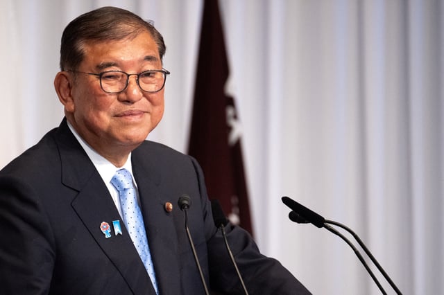 Japan's Prime Minister Shigeru Ishiba attends a press conference at the headquarters of the Liberal Democratic Party (LDP) in Tokyo on July 21, 2025, the day after the prime minister's coalition lost its upper house majority.