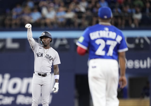 TORONTO, ON - JULY 3: Jazz Chisholm Jr. #13 of the New York Yankees celebrates his RBI double against the Toronto Blue Jays in the seventh inning in their MLB game at Rogers Centre on July 3, 2025 in Toronto, Ontario, Canada.