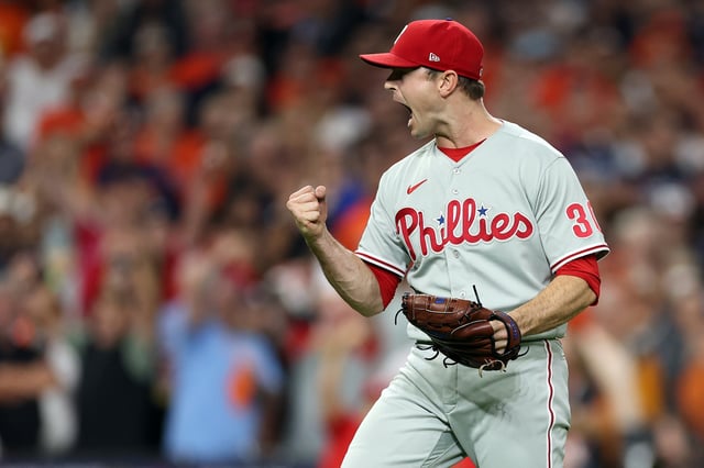 HOUSTON, TEXAS - OCTOBER 28: David Robertson #30 of the Philadelphia Phillies celebrates after beating the Houston Astros 6-5 in 10 innings in Game One of the 2022 World Series at Minute Maid Park on October 28, 2022 in Houston, Texas.