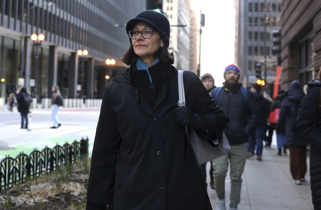 Defendant and former ComEd CEO Anne Pramaggiore walks down Dearborn Street after exiting the U.S. Dirksen Courthouse in downtown Chicago following the first day of the &#34;ComEd Four&#34; bribery conspiracy trial on March 14, 2023.