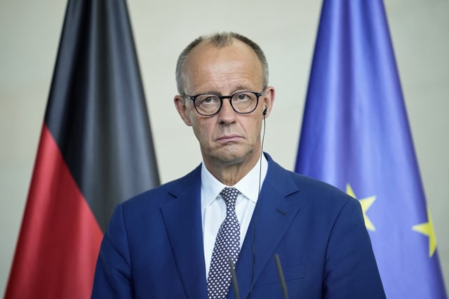German Chancellor Friedrich Merz attends a joint press conference with Romania's President Nicusor Dan at the chancellory in Berlin, Germany, Friday, July 18, 2025. (AP Photo/Ebrahim Noroozi)